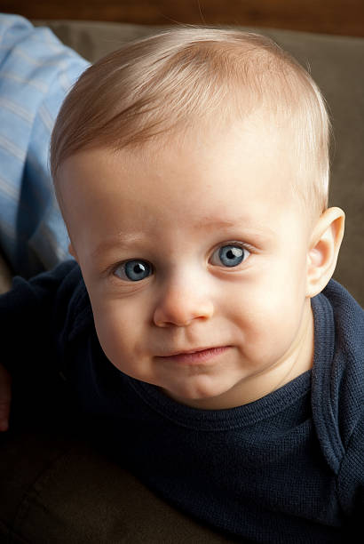 Baby With Blue Eyes stock photo