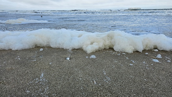 Sea foam coast of Tybee Island Georgia