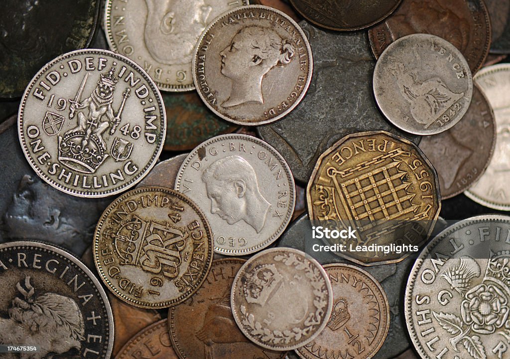 Obsolete British Coinage Pile of obsolete British coinage. Includes Victoria, George VI, Elizabeth II and denominations of Halfpenny, Penny, Threepence, Sixpence, Shilling, Florin. British Coin Stock Photo