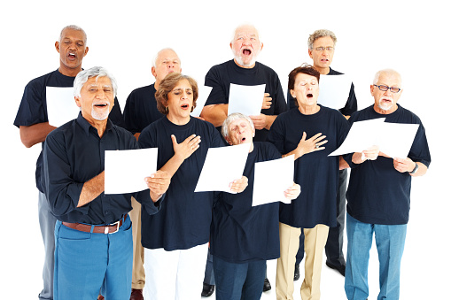 Elderly people singing hymns against white