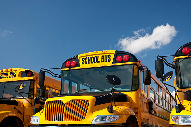 Yellow school bus waiting for students Back to school bus parked for the summer vacation empty school bus stock pictures, royalty-free photos & images