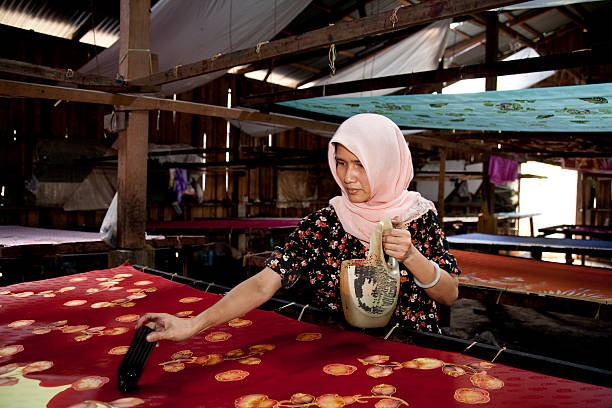 istock Malaysia, making batik, colorful clothes. 174676025