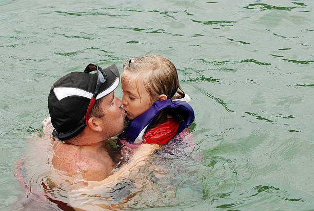 istock Kissing Daddy in the Lake 174676064