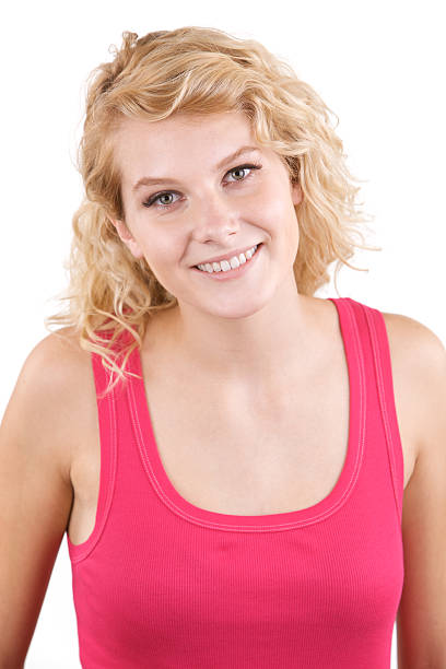 istock Beautiful smiling blonde isolated on white 174676078