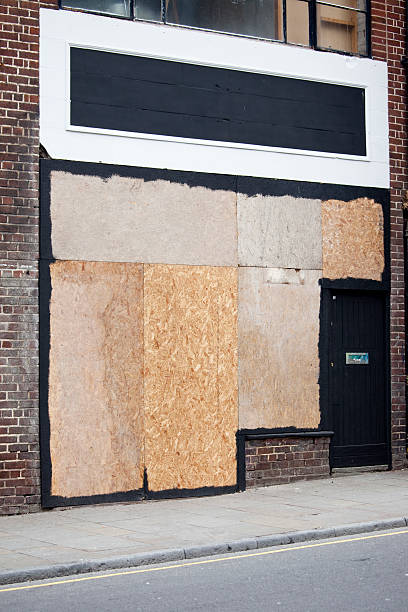 istock Economic hardship, boarded up windows and old buildings, Liverpool 174676343