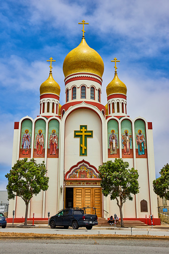 Image of Truck in front of Holy Virgin Cathedral in San Francisco on cloudy and blue sky day