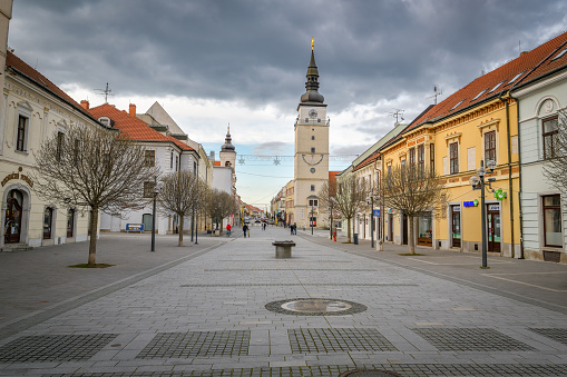 Trnava, Slovakia - February 26, 2023: People walking on street in city of Trnava in Slovakia during winter time in February 2023