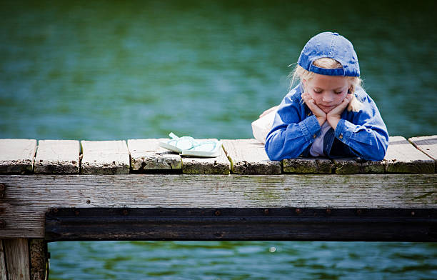 istock Cute Little Girl on Dock 174677728
