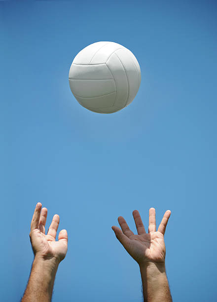 istock Man exercising and throwing ball in the air 174677797