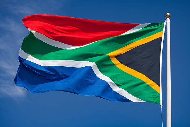Flag of South Africa South African flag waving in the wind. south africa flag stock pictures, royalty-free photos & images
