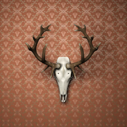 Deer head on brownish wallpaper with floral motif and silvery outlines. 3d render.
