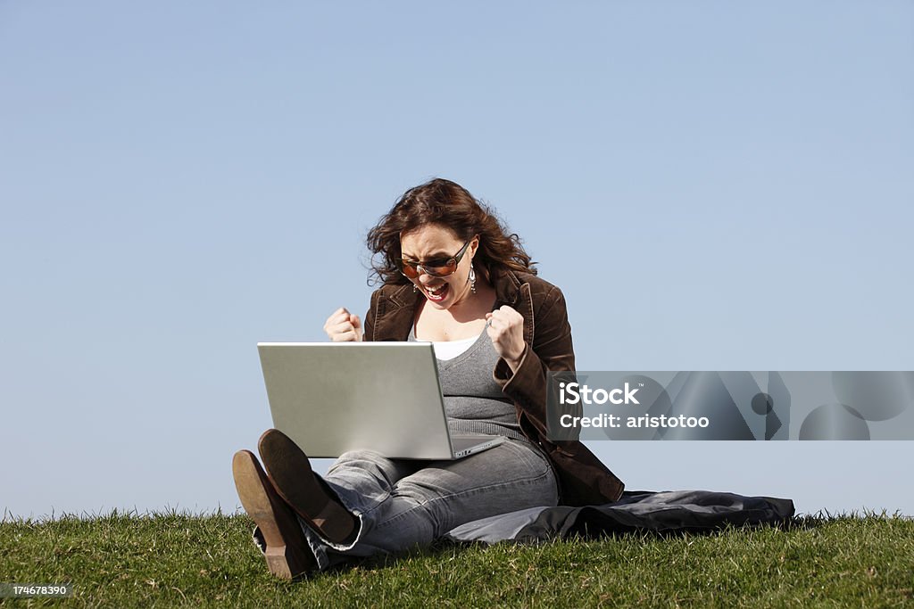 Cheerful Woman Cheerful woman with clenched fists. Adult Stock Photo