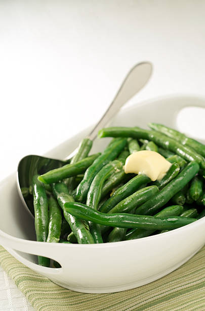 istock Healthy Steamed Green Beans with Butter, White Bowl 174678706