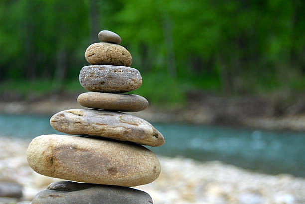 Cairn, aka Stack of Rocks "River-worn stones stacked with care beside the Buffalo River in Arkansas. Need photos representing the people, places and natural beauty of Arkansas" cairns photos stock pictures, royalty-free photos & images
