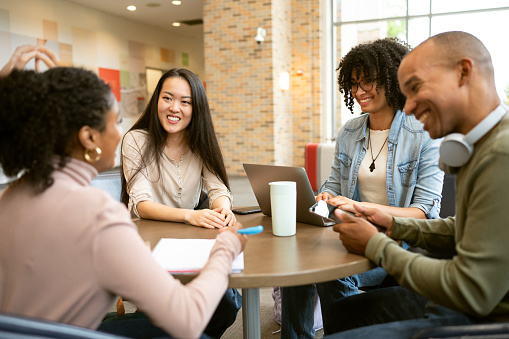 University students during round-table discussion in the student center