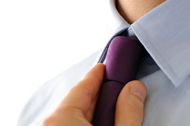 istock Manager, close-up of tie, shirt and hand 174679135