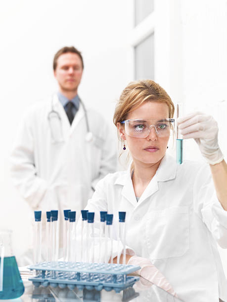 istock Researcher working with chemicals 174679306