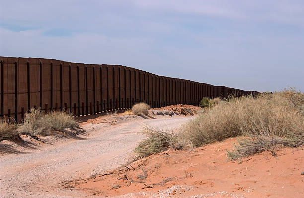 Border Fence - New Mexico  international border barrier stock pictures, royalty-free photos & images