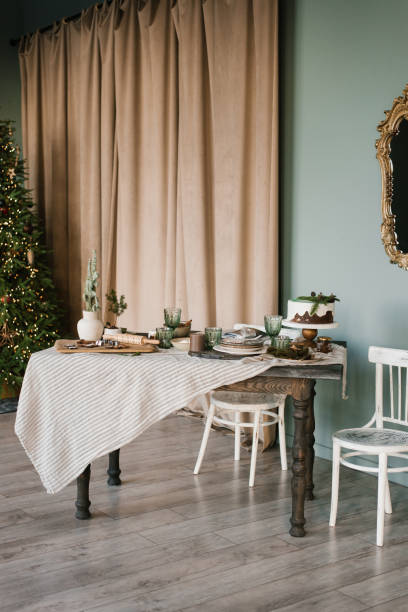 istock Festive Christmas dinner table in the living room 1746801080