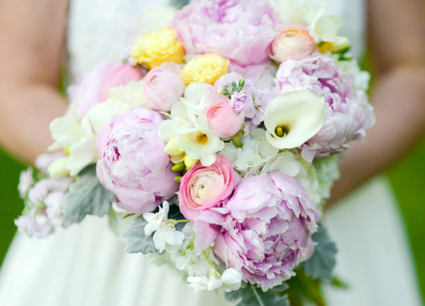 istock Bride holding her Bridal Bouquet 1746805520