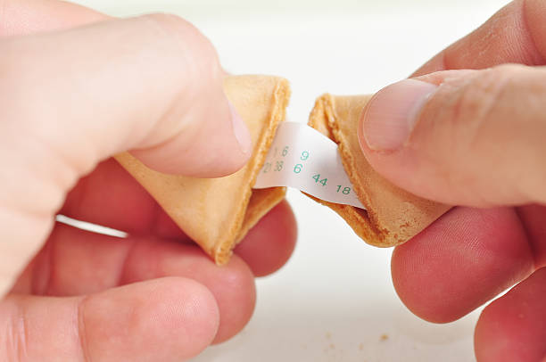 te numery traf - luck fortune telling cookie fortune cookie zdjęcia i obrazy z banku zdjęć