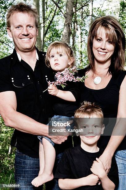 Family Of Four Stock Photo - Download Image Now - 30-39 Years, Adult, Boys