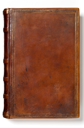 200 year old leather book. Lovely warm brown color. Has that beautiful patina that only centuries can create. Slight scratches and marks add to antique character. Lots of copy space.