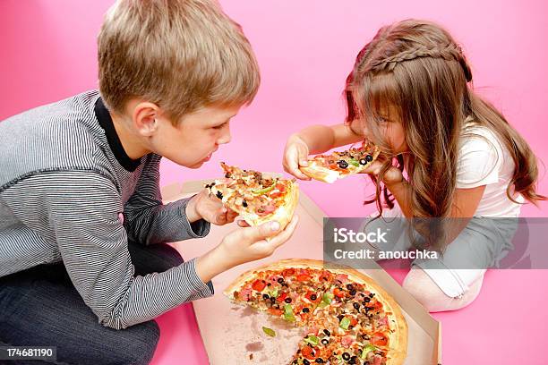 Kids Eating Pizza Stock Photo - Download Image Now - 10-11 Years, 6-7 Years, Addiction