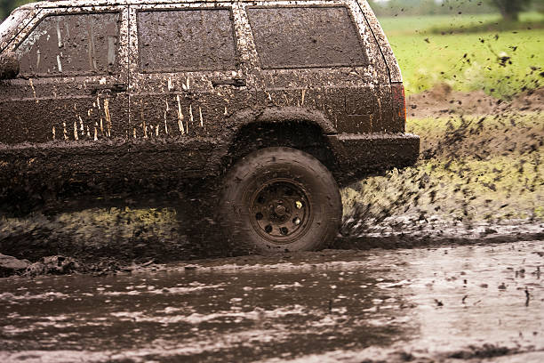 istock Off road vehicle driving along muddy trail 174681533