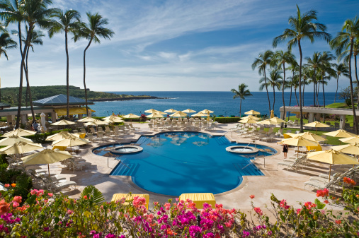 Waikiki, United States – April 27, 2017: The Hale Koa Hotel in Waikiki Hawaii with fountain in front