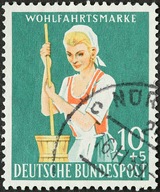 istock woman churning butter 174682810