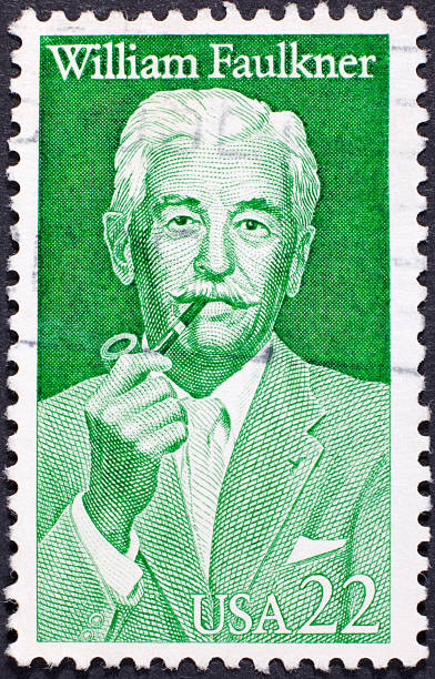 ビンテージ郵便切手ウィリアム・フォークナー - william faulkner ストックフォトと画像