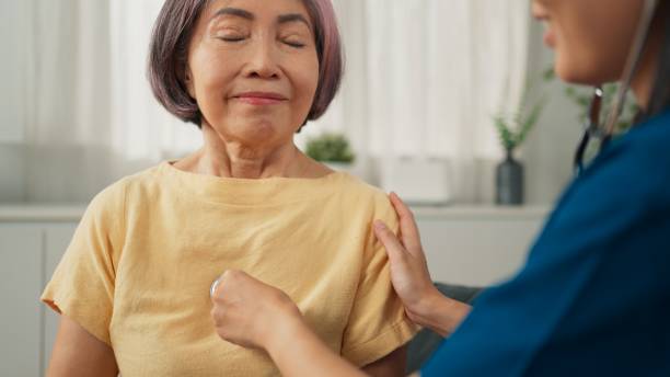 istock Doctor examining senior grandmother during home visit, Professional physician using stethoscope to check and listen to heartbeat in checkup appointment 1746837171