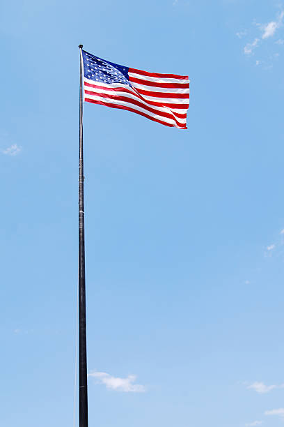 istock United States Flag On Flagpole 174684200