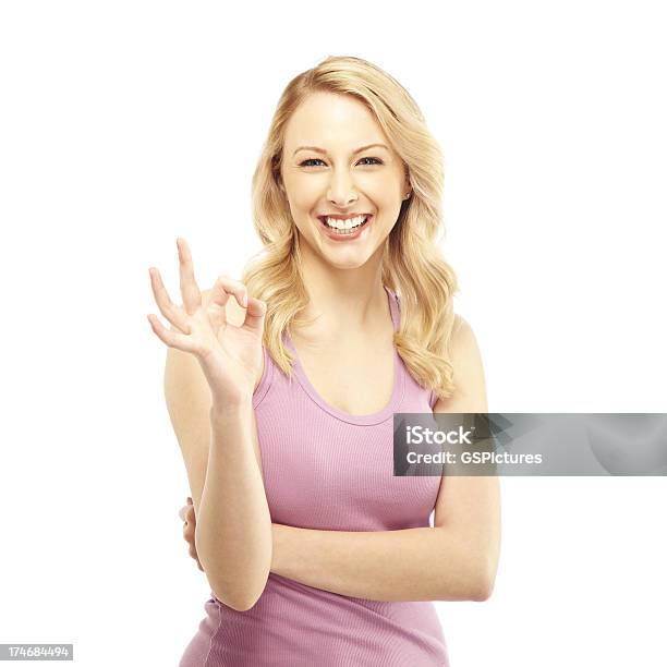 Attractive Blond Woman Making Ok Hand Gesture Stock Photo - Download Image Now - 20-24 Years, 20-29 Years, Adult