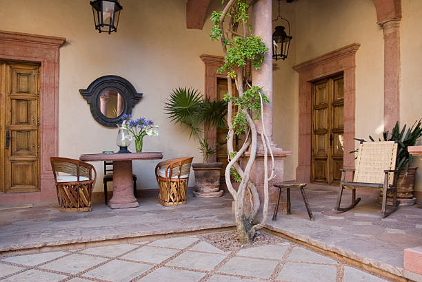 istock Charming Mexican Courtyard Patio with Tables and Chairs 174684691