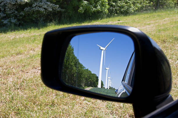 istock Wind turbines in the side-view mirror of a car. 174685260