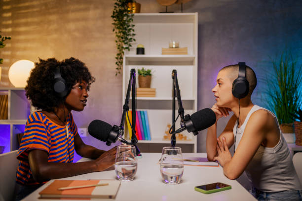 istock Two podcasters are sitting in a home recording studio 1746857419