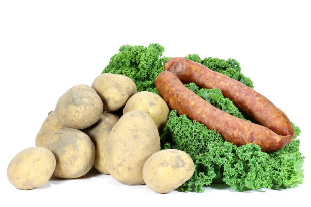 ingredients of a traditional German curly kale meal isolated on white background
