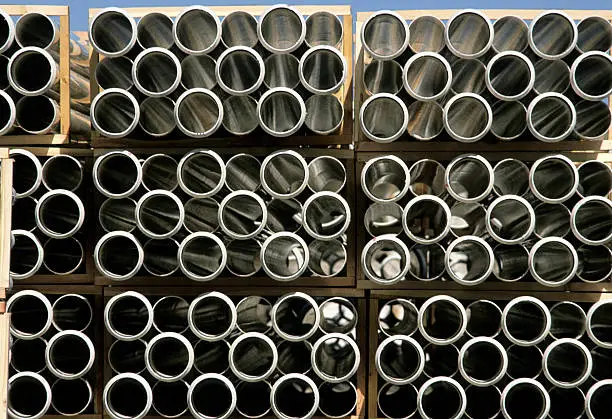 Wood-crated extruded plastic storm-drain pipes ready for shipment