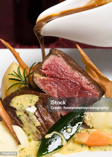 Fillet Steak With Sauce And Vegetables Stock Photo - Download Image Now - Pouring, Bearnaise, Gravy