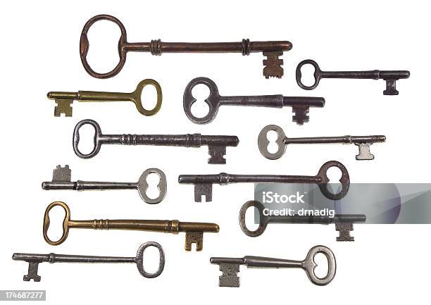 Antique Skeleton Keys Displayed On A White Background Stock Photo - Download Image Now