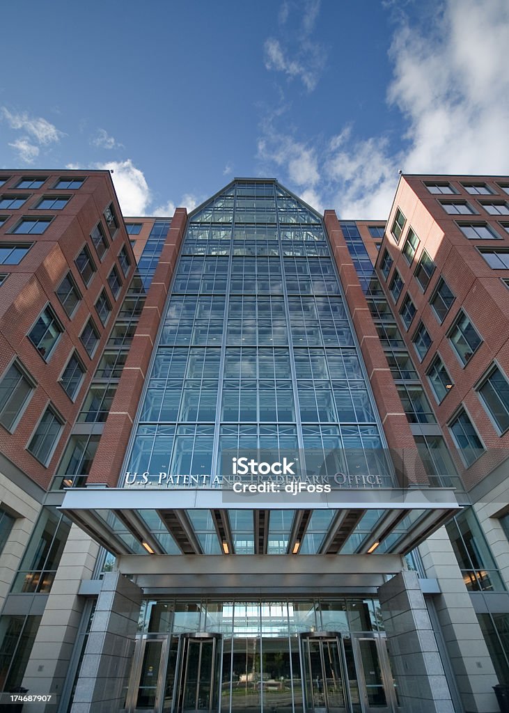 Low view of a modern office building standing tall US Patent and Trademark Office in Alexandria, VA. Intellectual Property Stock Photo