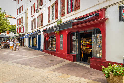Front of a Etxe Peio basque shop in a street of Saint-Jean-de-Luz, France