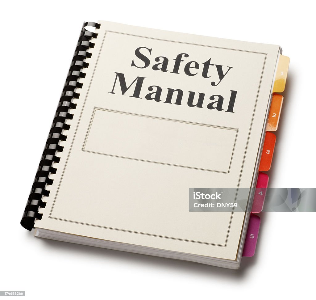 Safety Manual A safety manual. Clipping path included. Handbook Stock Photo