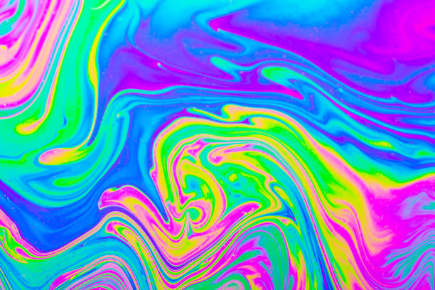 istock Psychedelic multicolored background abstract. Rainbow colors. patterns background. Photo macro shot of soap bubbles 1746883885