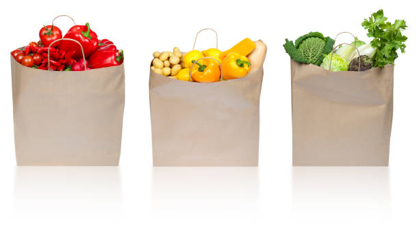 istock red green yellow vegetable composition in paper shopping bag iso 174689023