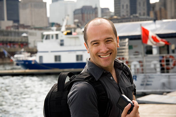istock Man Tourist with Camera at Old Port Montreal 174690003