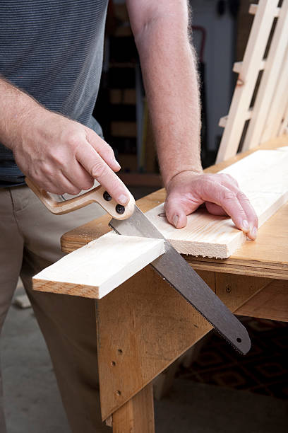 istock Cutting a piece of wood 174690591