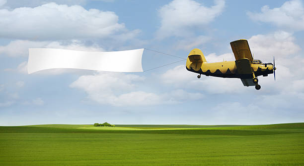 Plane with blank banner. stock photo